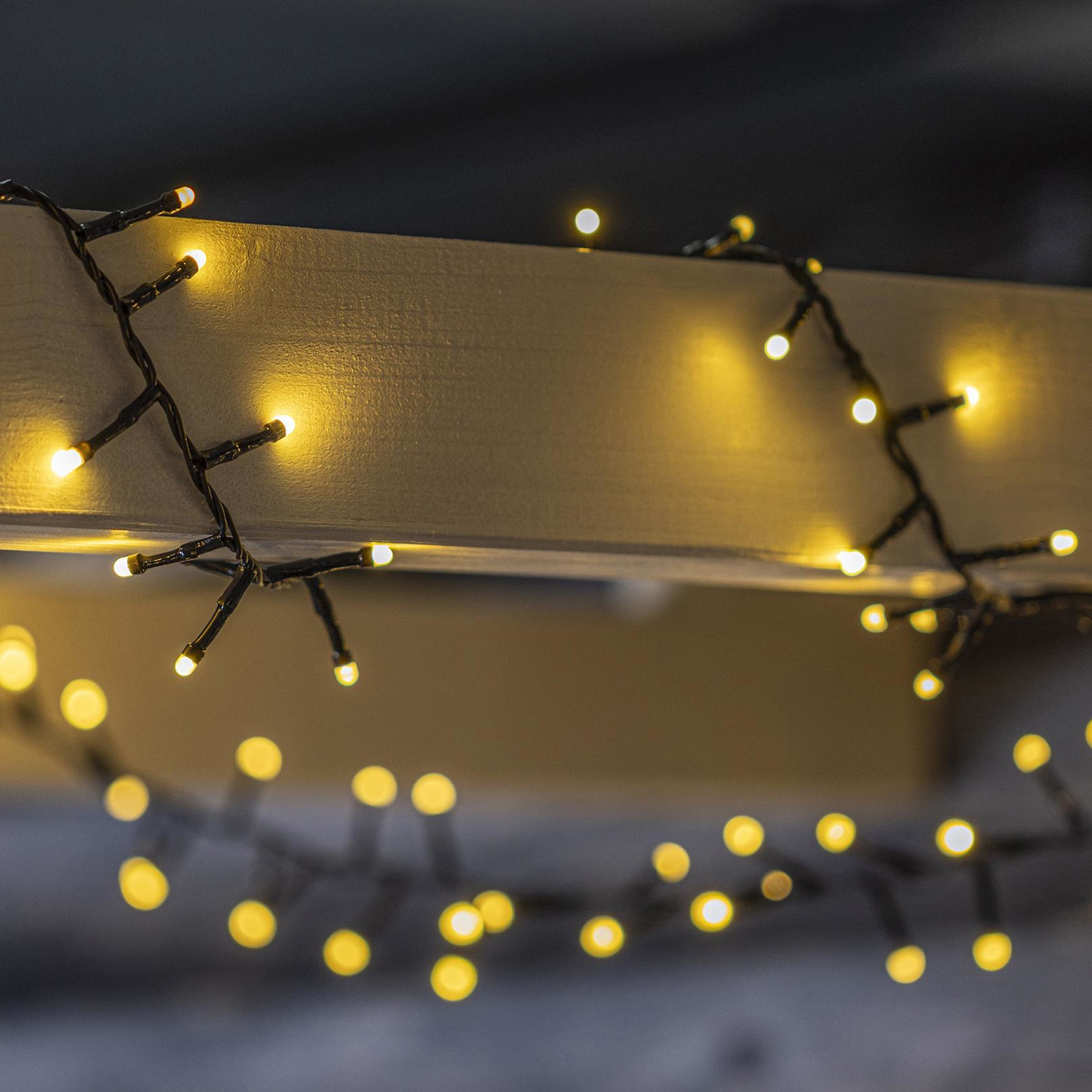 LED Lichterkette mit Kabelaufroller - 1000 warmweiße LED - L: 20m - Außen - Trafo - schwarz