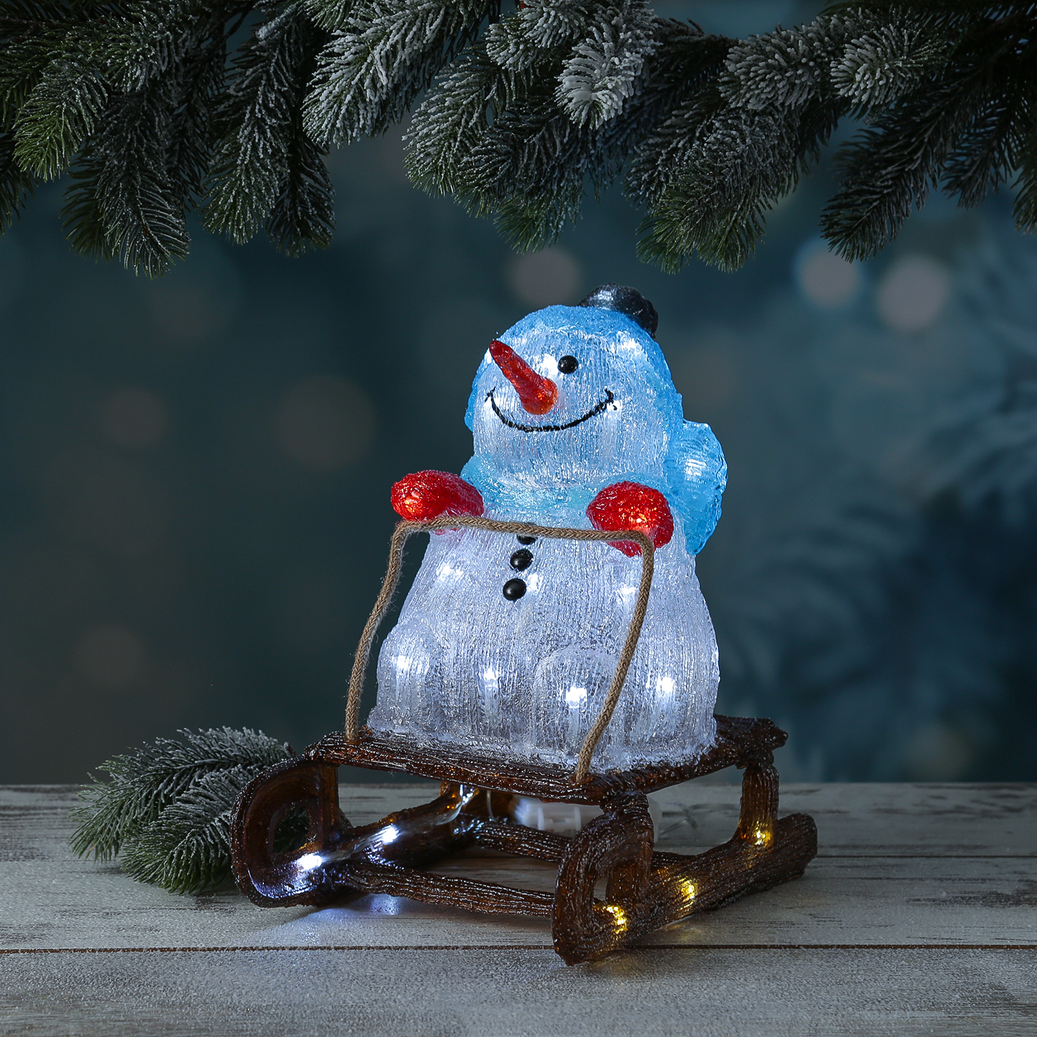 LED Schneemann mit Schlitten - Acrylfigur - 30 kaltweiße LED - H: 32cm - Timer - für Außen LED Schneemann mit Schlitten - Acrylfigur - 30 kaltweiße LED - H: 32cm - Timer - für Außen